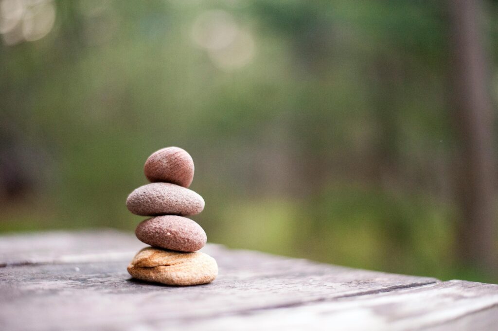 pexels-photo-668353-668353 Balance and tranquility embodied by stacked stones in a natural outdoor setting.